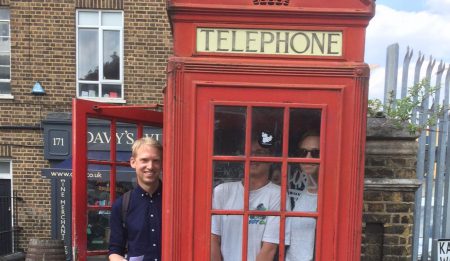 Team one, squeezed into a red phone box, for 20 points.