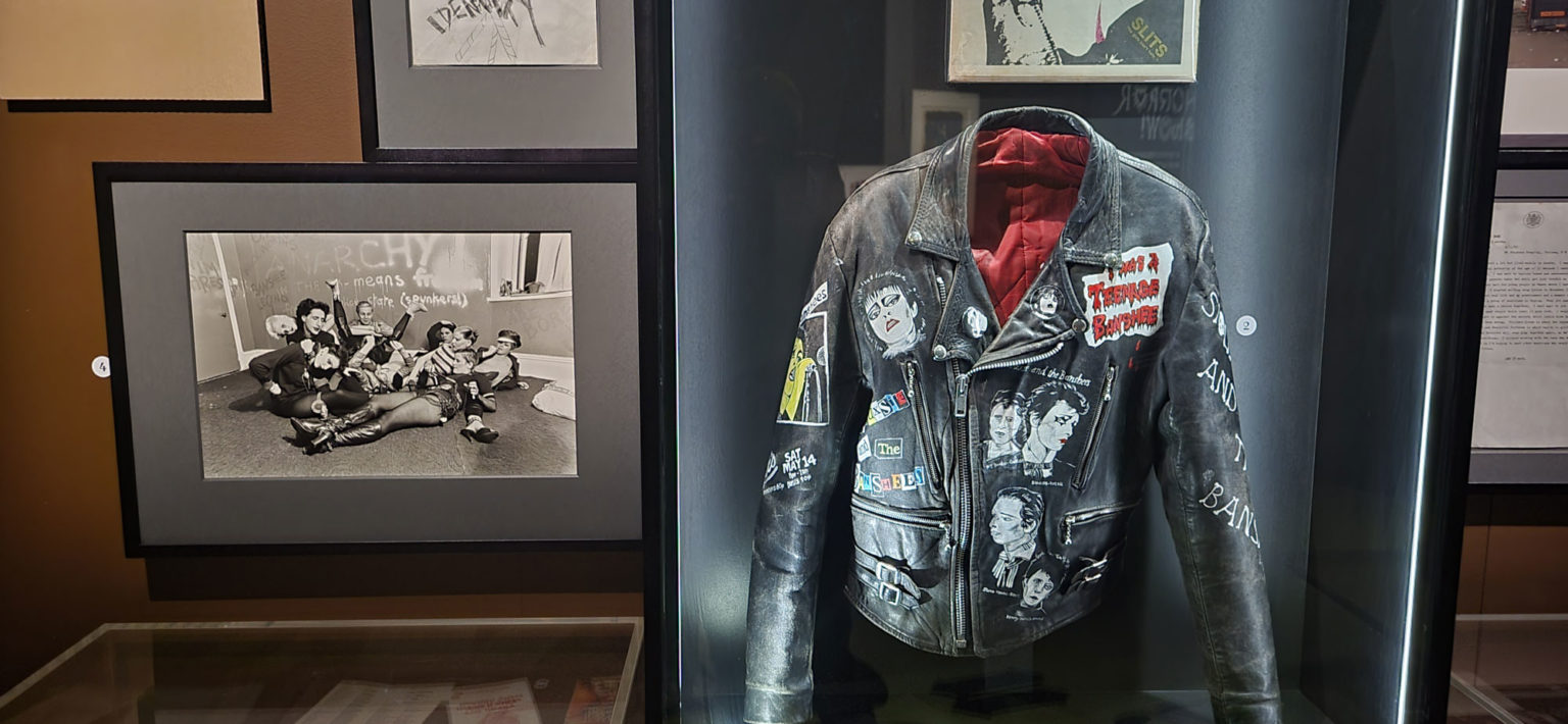 A fashion centrepiece display of a leather jacket