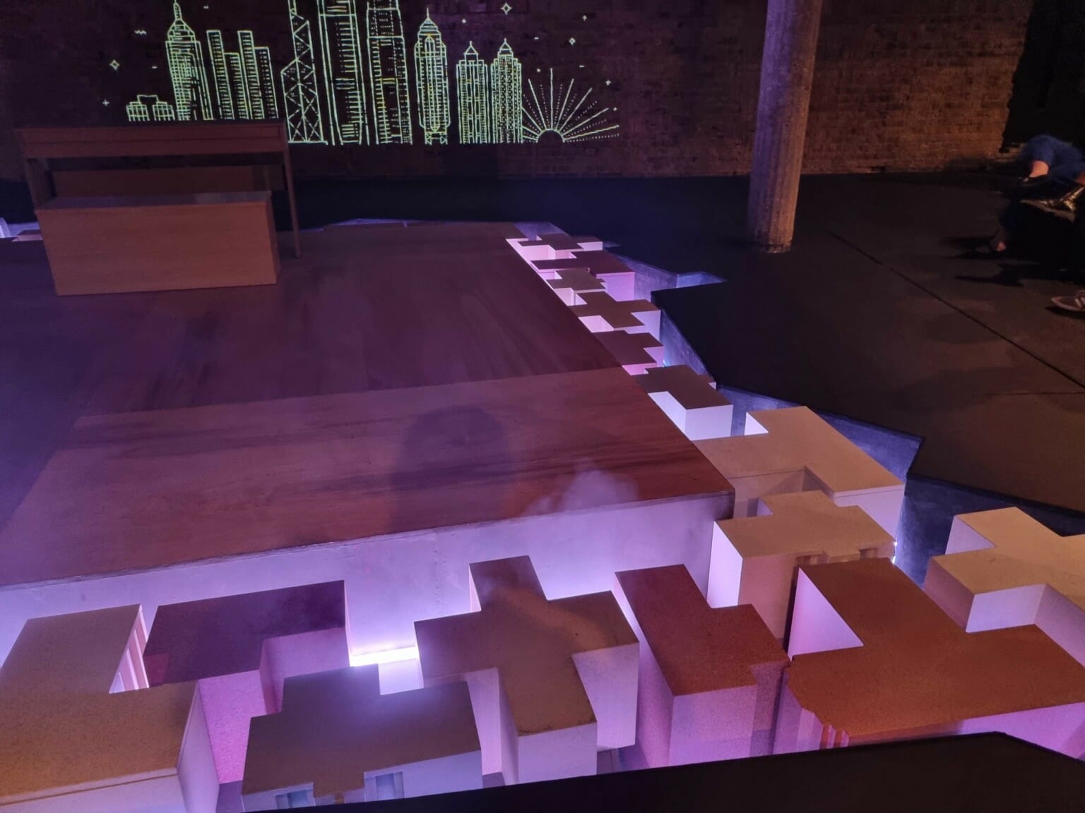 Liam Bunster's Set for A Playlist for the Revolution - A series of blocks recessed into a floor in the trench