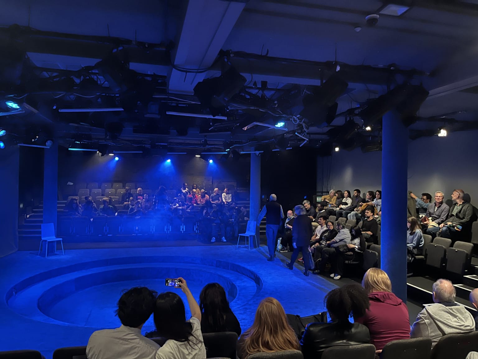 The audience settling in The Holloway Theatre before the show