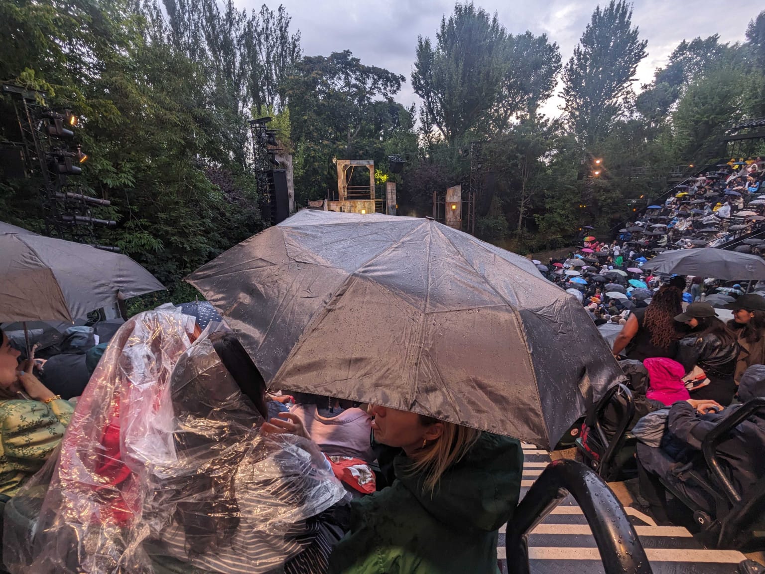 Obstructed view: when the umbrellas went up Justin couldn't see a thing