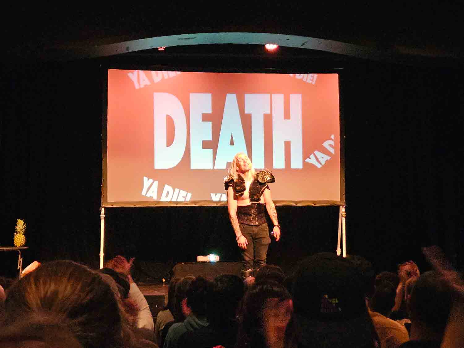 John Robertson as the manic games master of The Dark Room