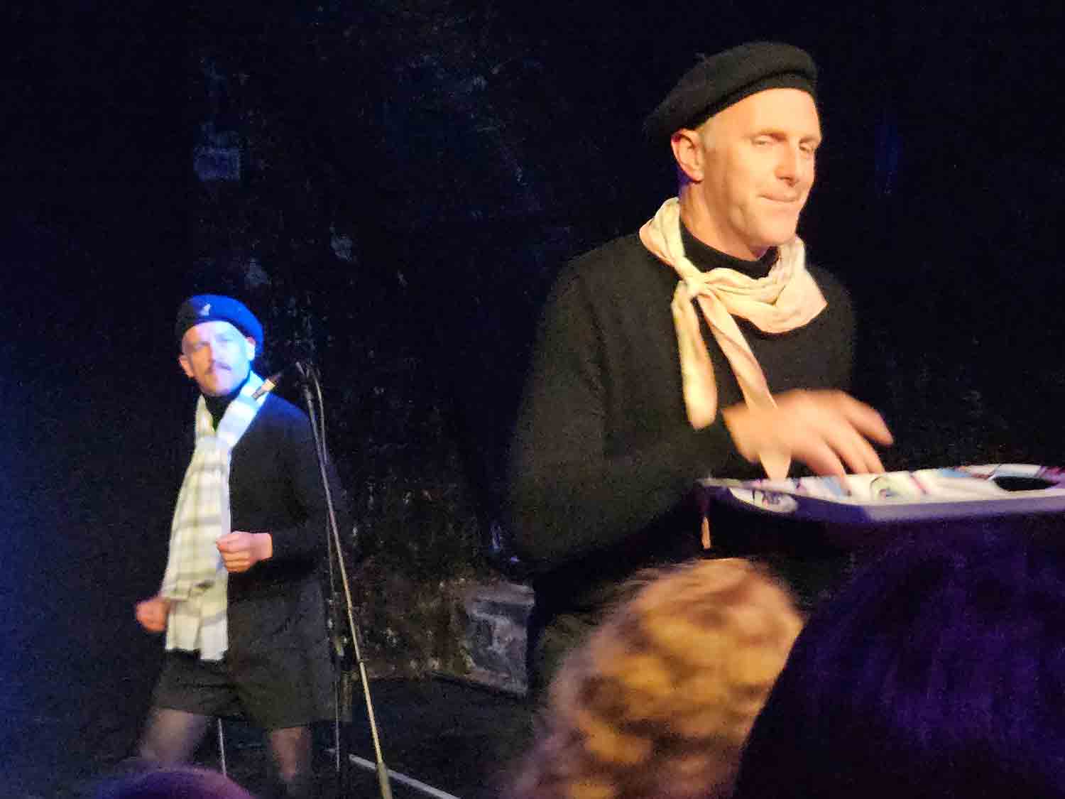Trygve Wakenshaw and Barnie Duncan serving invisible drinks