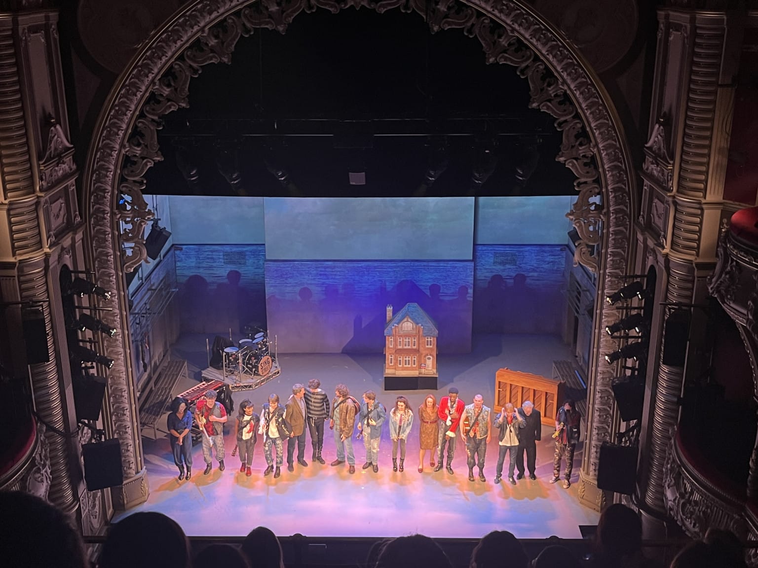 The cast coming together to take a bow