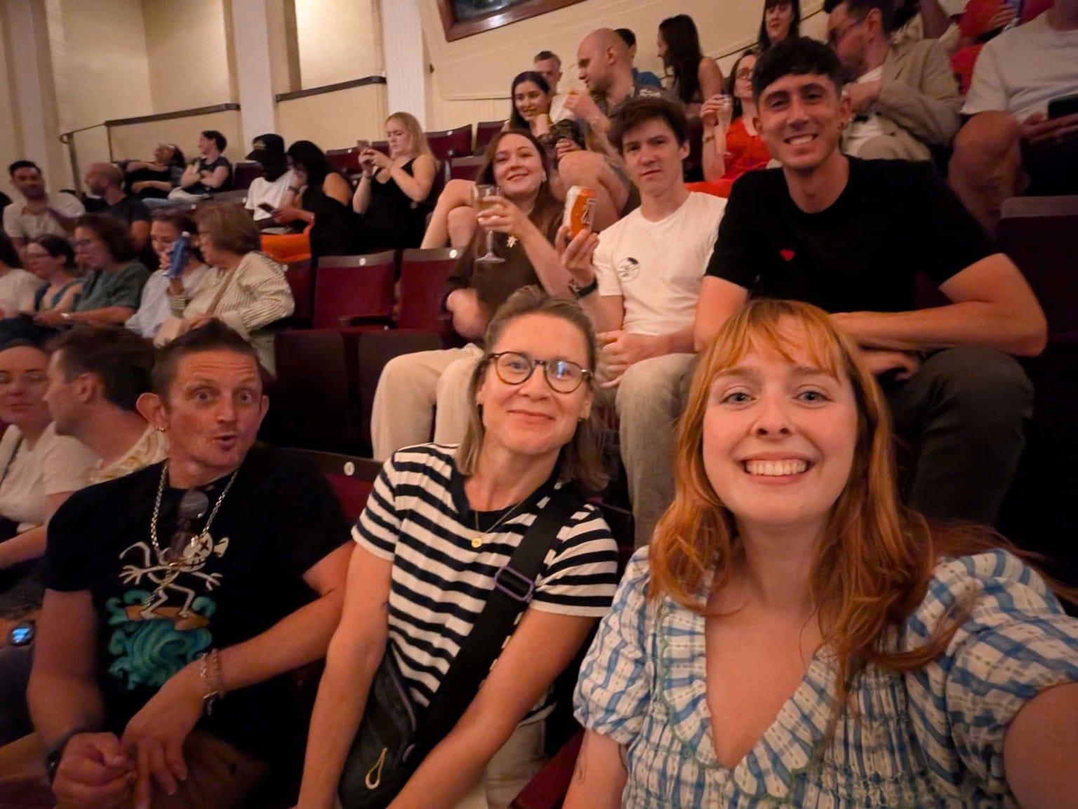 Big smiles, waiting for the show to start. 